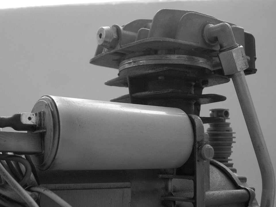A black and white picture of the air compressor machine