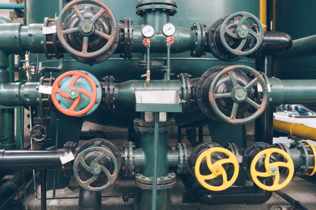 steel pipelines and cables in a plant